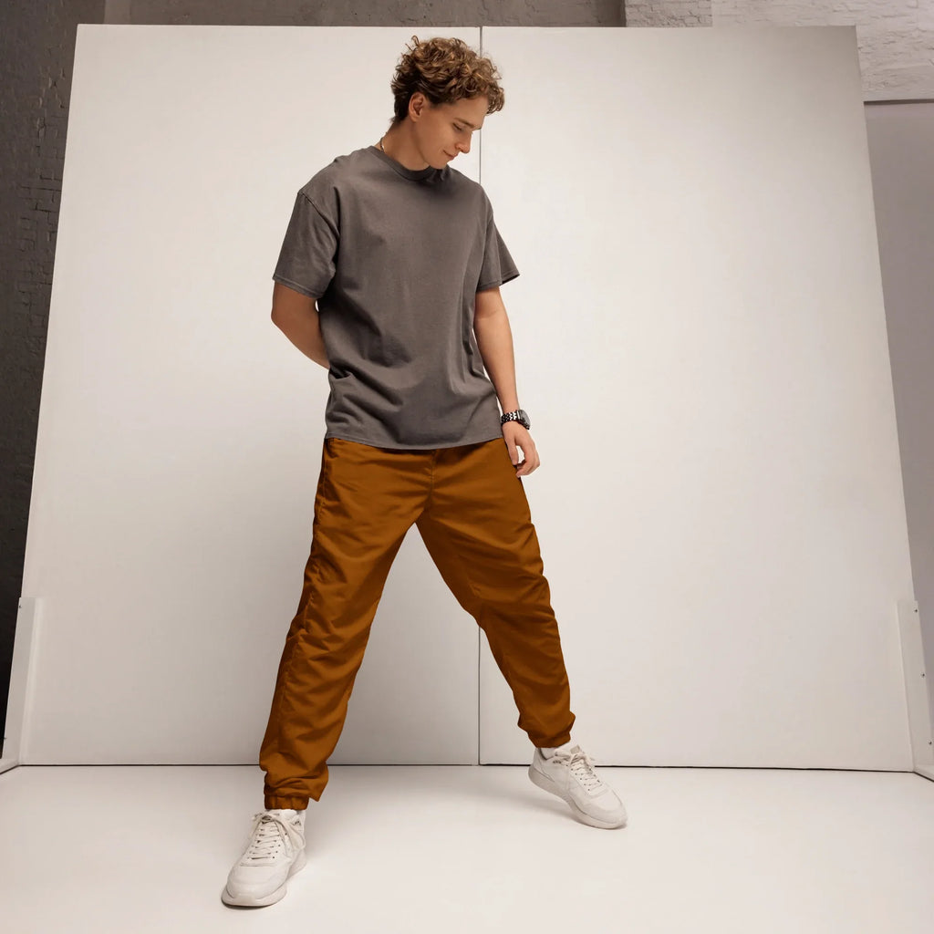 Unisex Track Pants Brown-Orange Track Pants AwRans Clothing all-over-print-unisex-track-pants-black-front-6790cba0eb05a