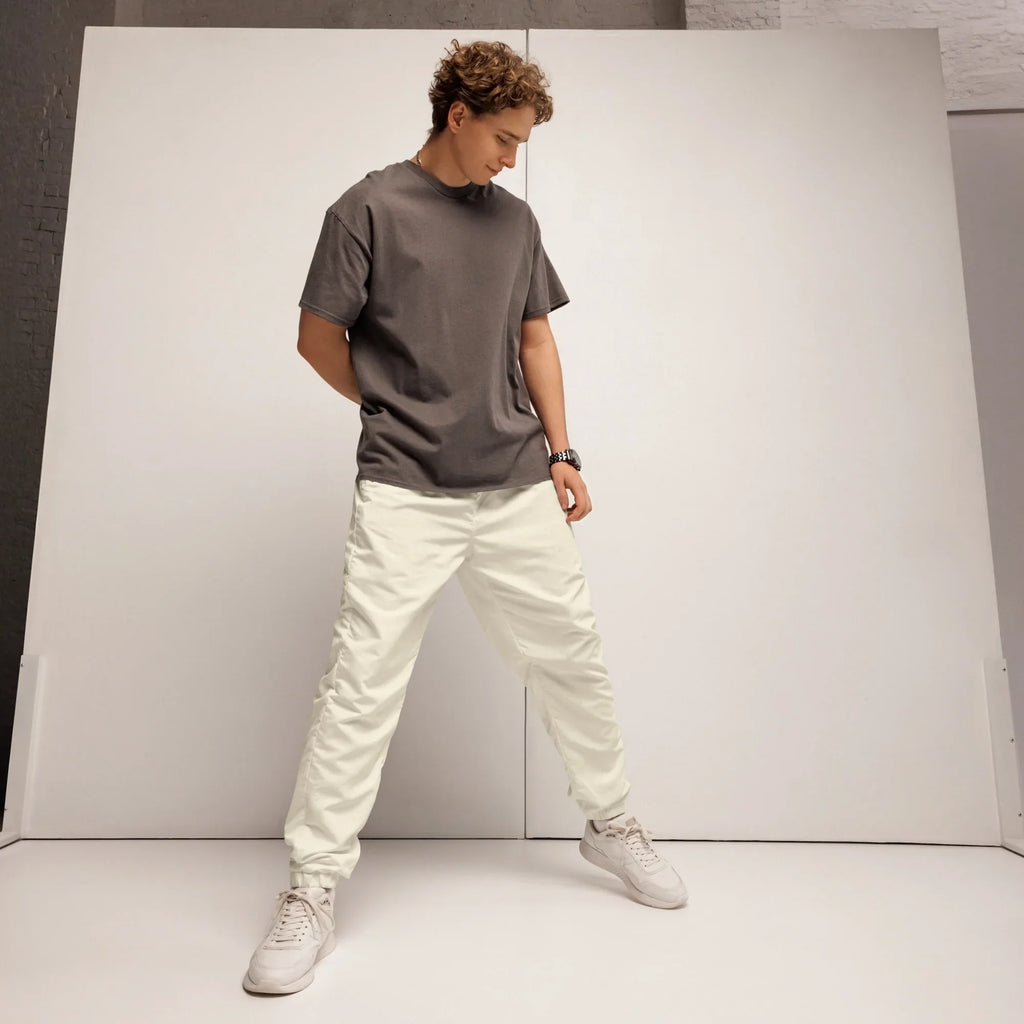 Unisex Track Pants Ivory Track Pants AwRans Clothing all-over-print-unisex-track-pants-white-front-6790da70ec622