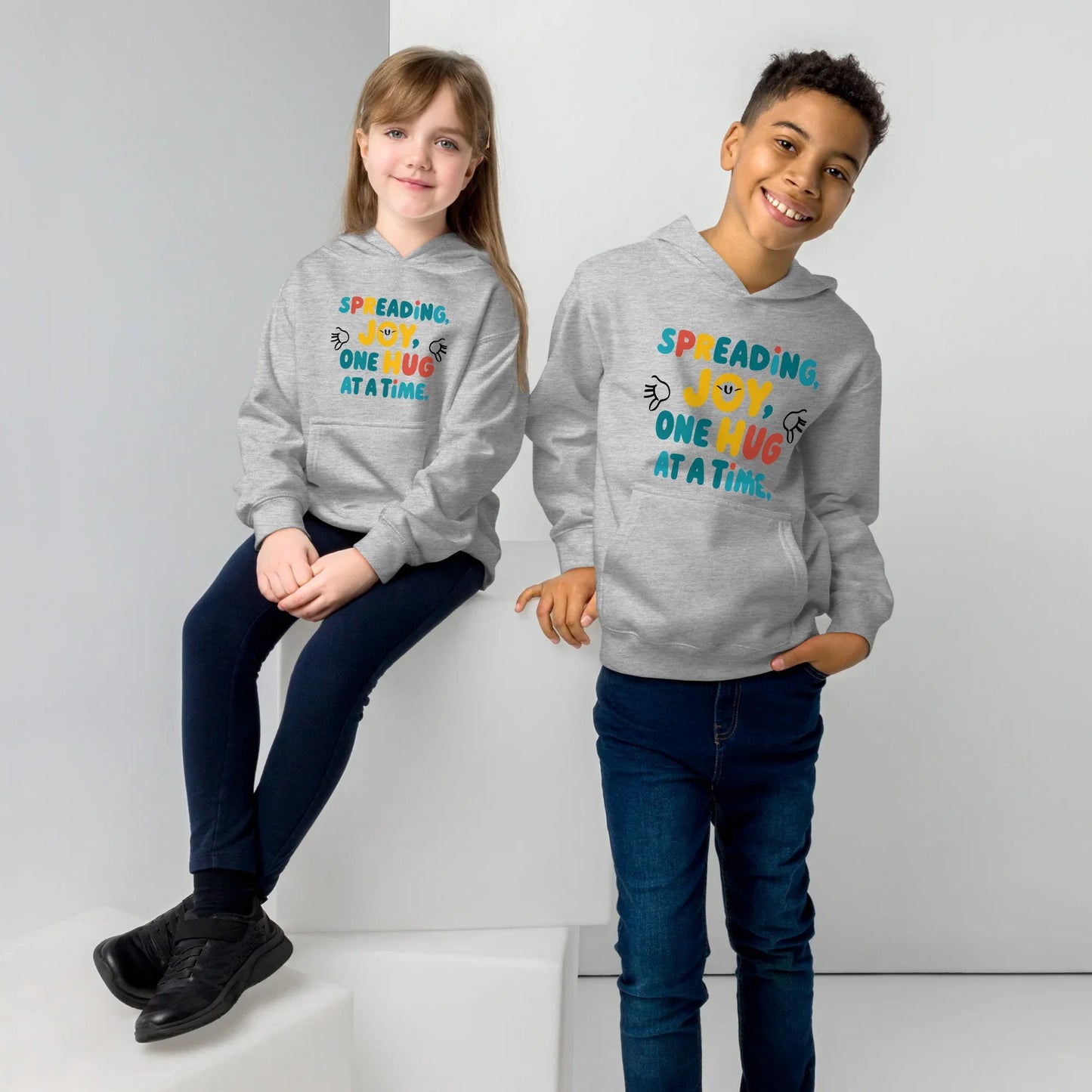 Spreading Joy One Hug At A Time | Kids Fleece Hoodie - AwRans Clothing