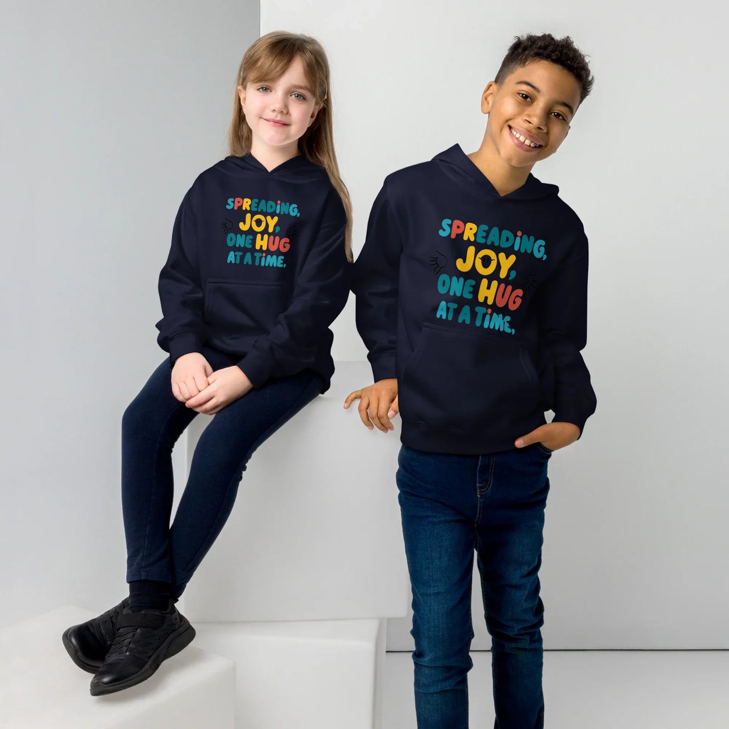 Spreading Joy One Hug At A Time | Kids Fleece Hoodie - AwRans Clothing