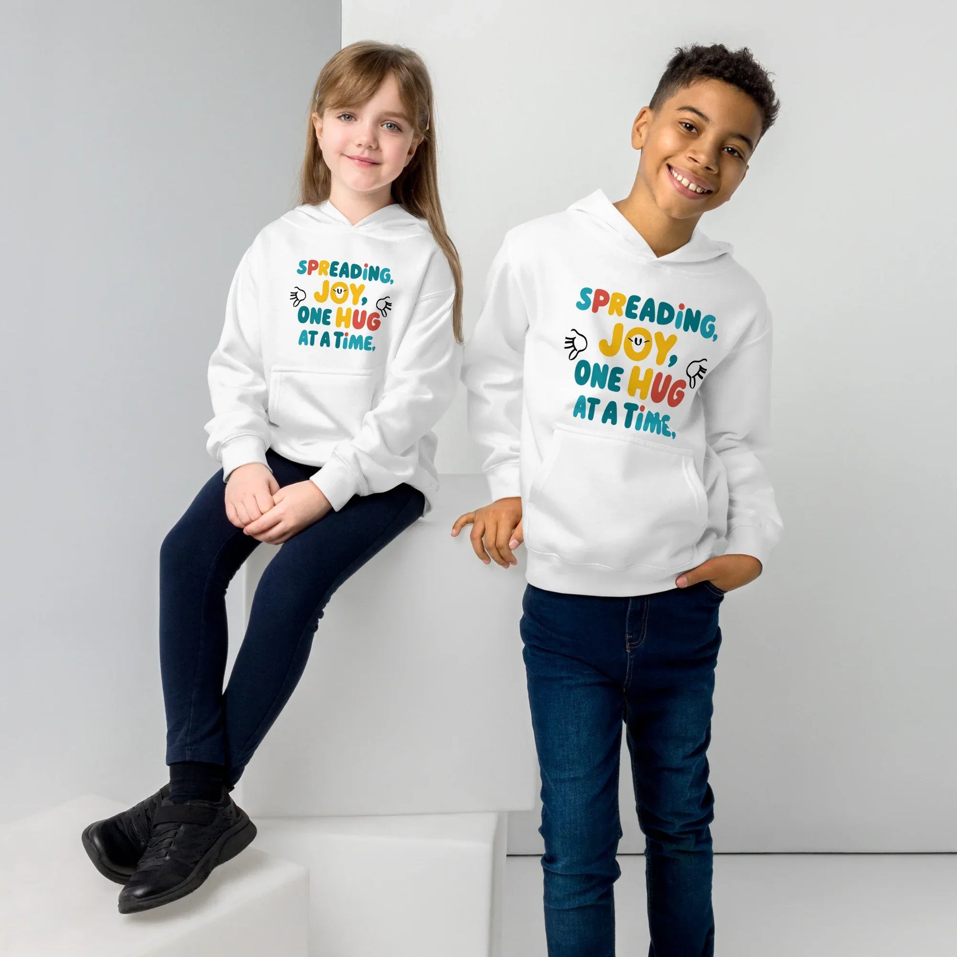Spreading Joy One Hug At A Time | Kids Fleece Hoodie - AwRans Clothing