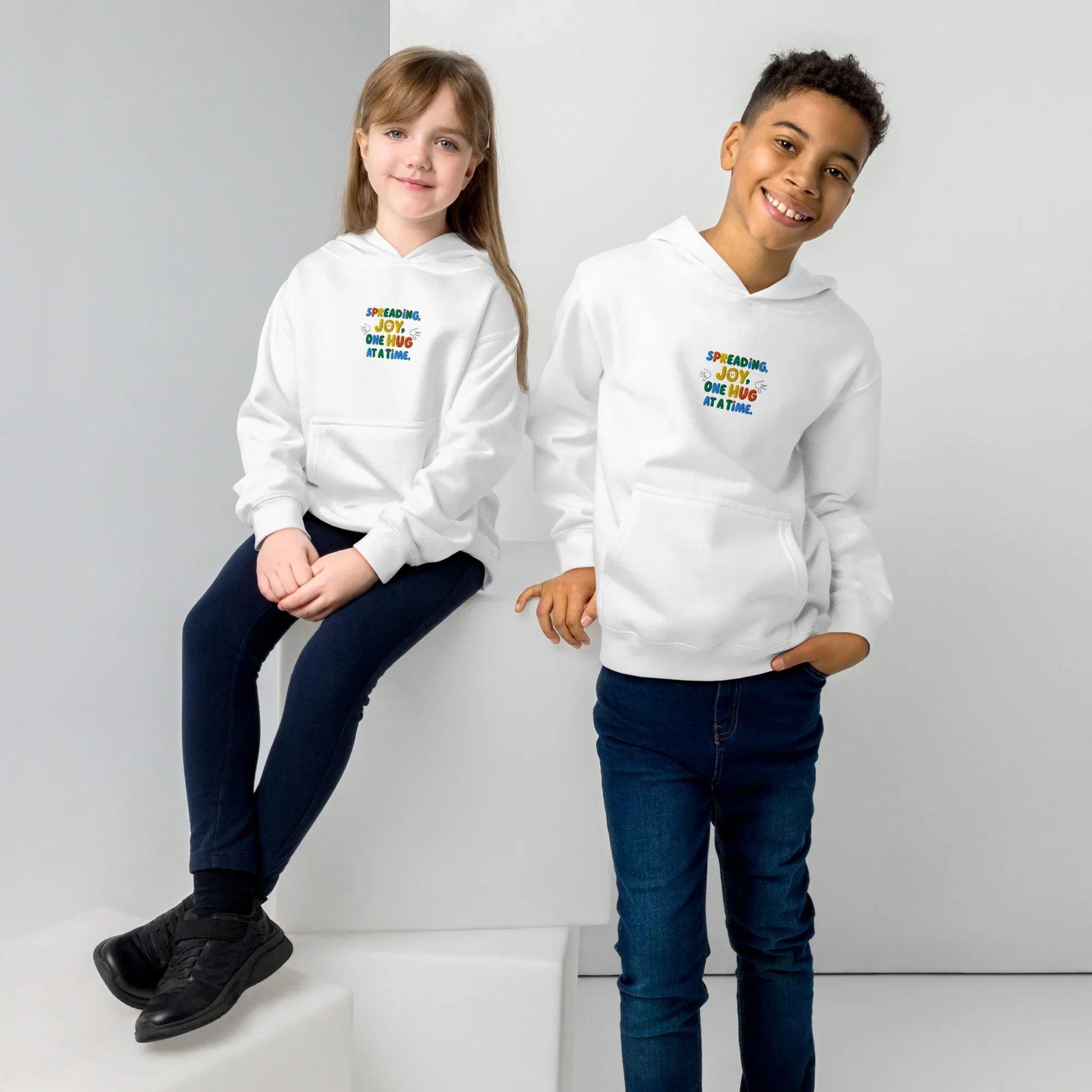 Spreading Joy One Hug At A Time | Kids Embroidered Fleece Hoodie - AwRans Clothing