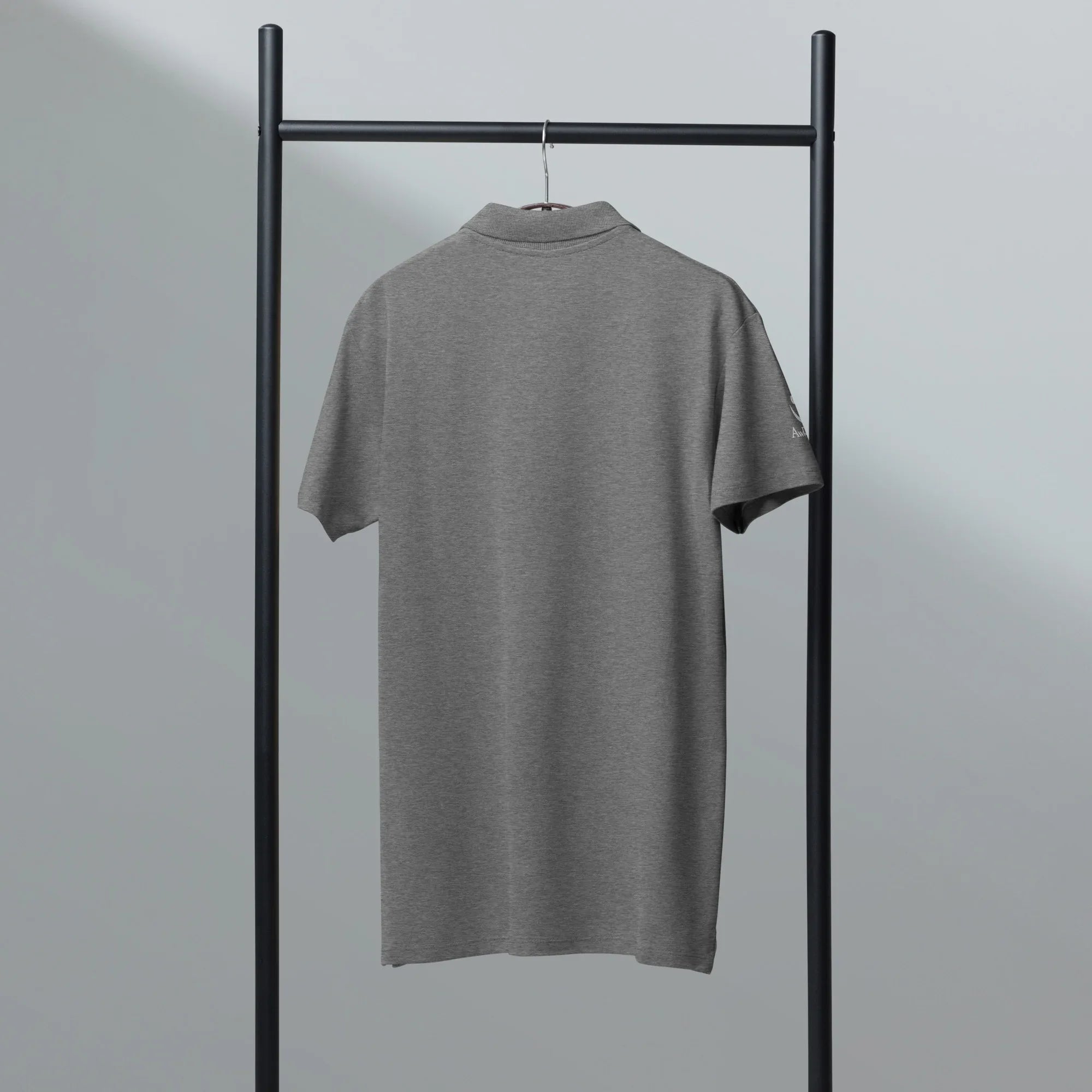 Refined. Timeless. You. Unisex Premium Pique Polo Shirt polo shirt AwRans Clothing unisex-premium-pique-polo-shirt-grey-melange-back-67ba6803c180a