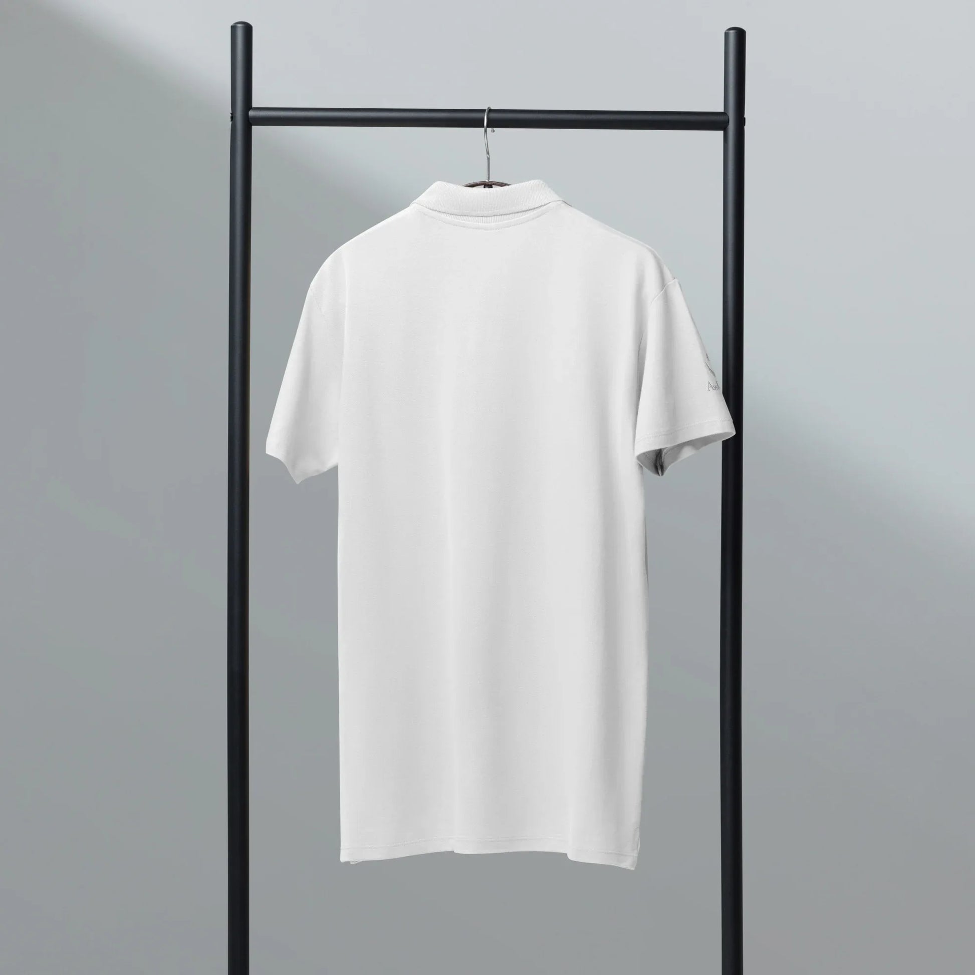 Chic with purpose. Unisex Premium Pique Polo Shirt - AwRans Clothing