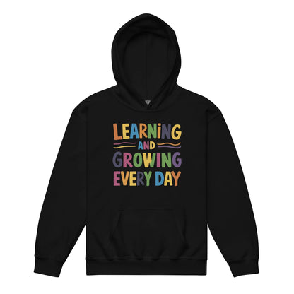 Learning And Growing Everyday | Youth Heavy Blend Hoodie - AwRans Clothing